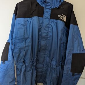 The North Face Men's Blue and Black Jacket. Good Condition
